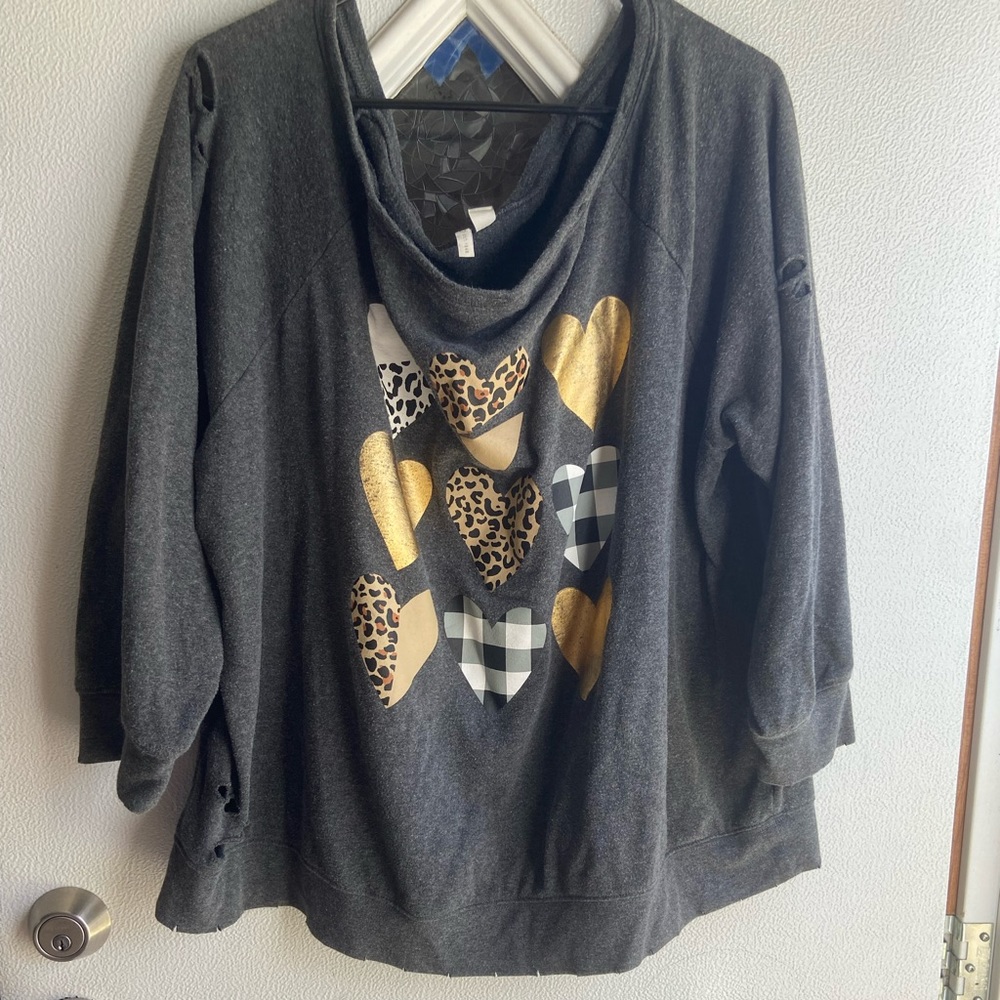 Gray sweatshirt.